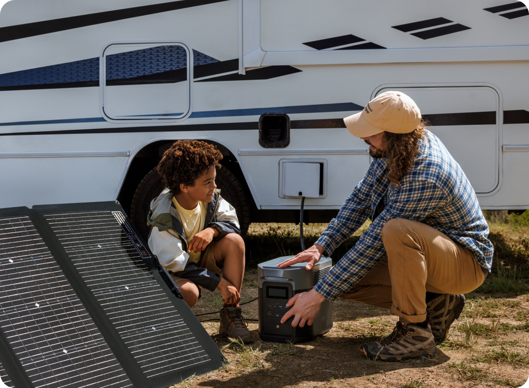 A father and son connect a DELTA Pro to a self-supporting EcoFlow solar panel and to their RV.