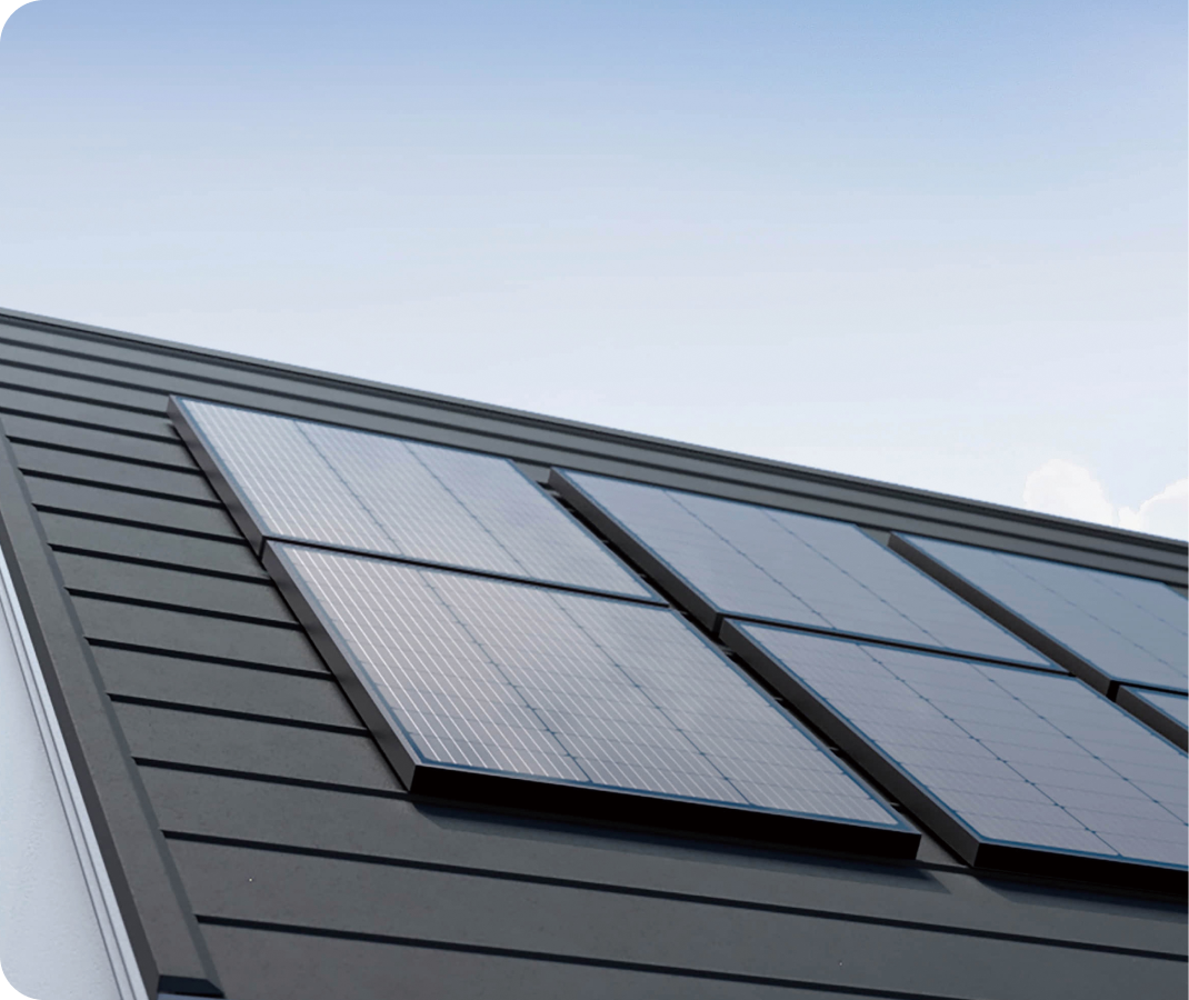 An array of EcoFlow 100W Rigid Solar Panels are mounted on a house's roof.